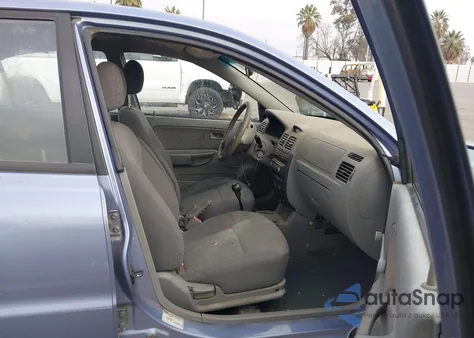 2003 Kia Rio z USA, uszkodzony, nr VIN KNADC125836279719